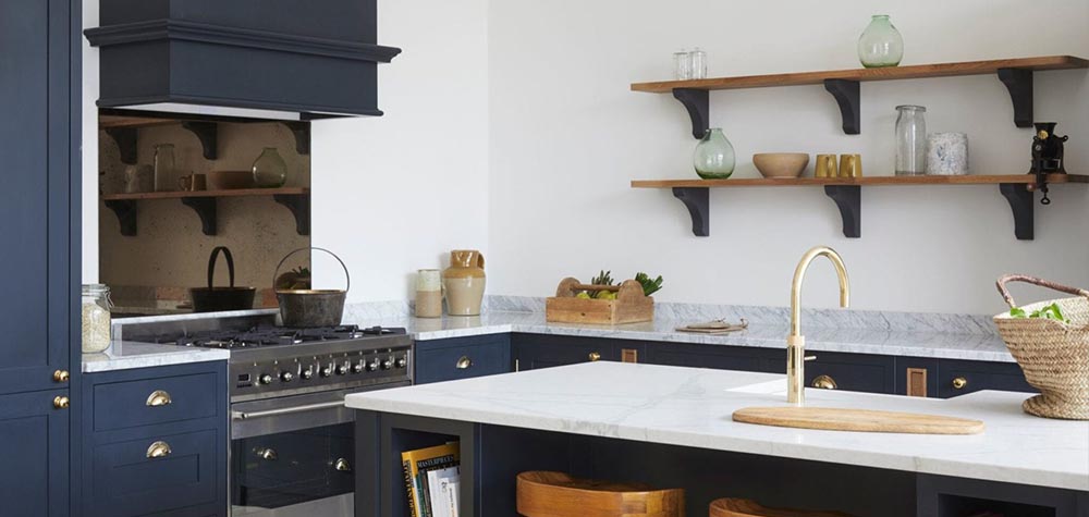 Malvern Showroom navy blue shaker kitchen with stone worktop