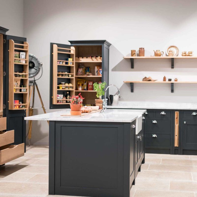 Olive & Barr Shaker kitchen with open cupboards and Island.